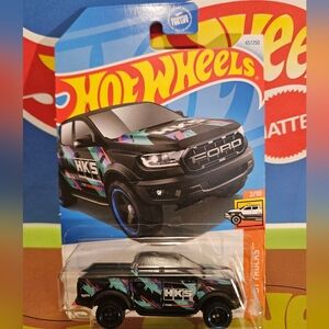 HotWheels Ford Raptor Black and Blue Truck
